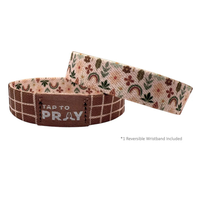 Two wristbands with floral and plaid patterns on a white background