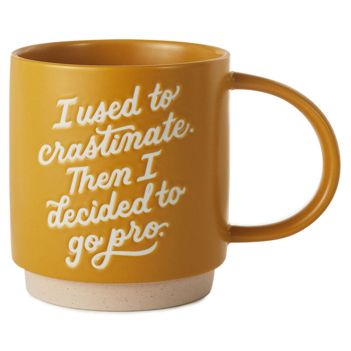 Yellow mug with white text on a white background
