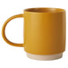 Yellow mug with a beige base on a white background