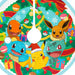 Cartoon characters in a festive setting with a Christmas tree, presents, and decorations.
