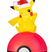 Yellow Pikachu character with a Santa hat on top of a red ball on a white background