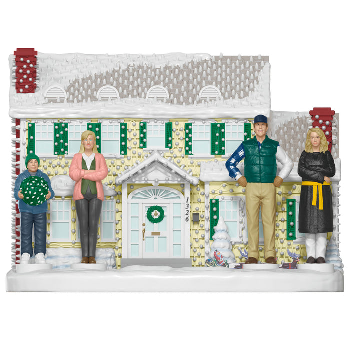 Decorative scene with a house and characters in front, featuring a white background.