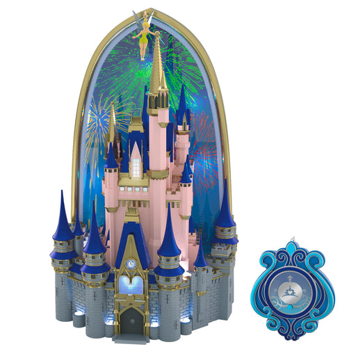 Fantasy castle model with blue spires and a smaller clock face model on a white background