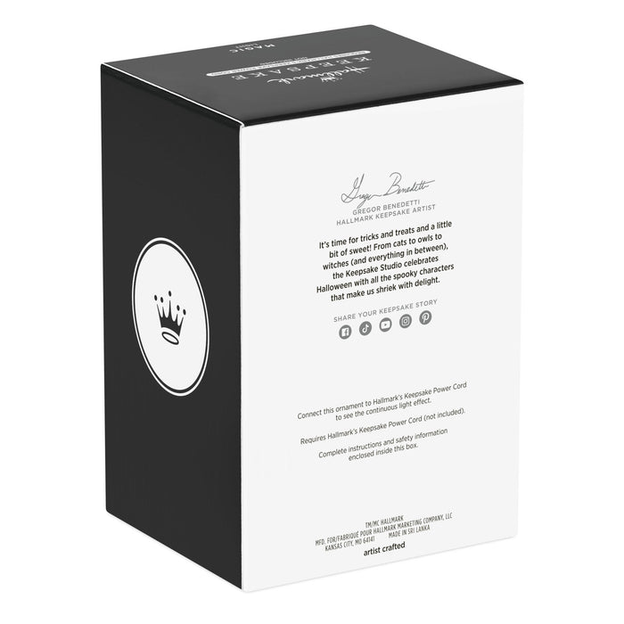 Halloween-themed product packaging with text and a logo on a white background