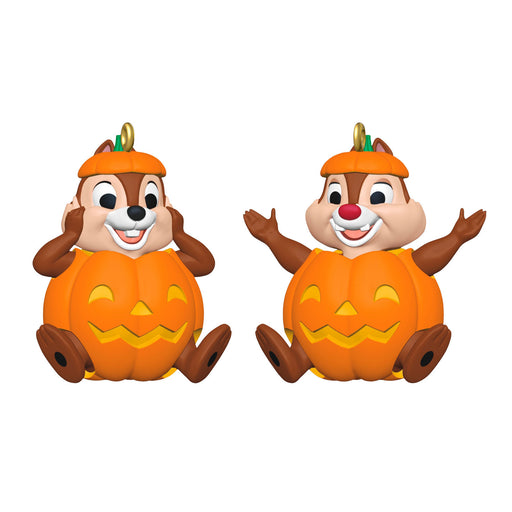 Two animated chipmunks in pumpkin costumes on a white background