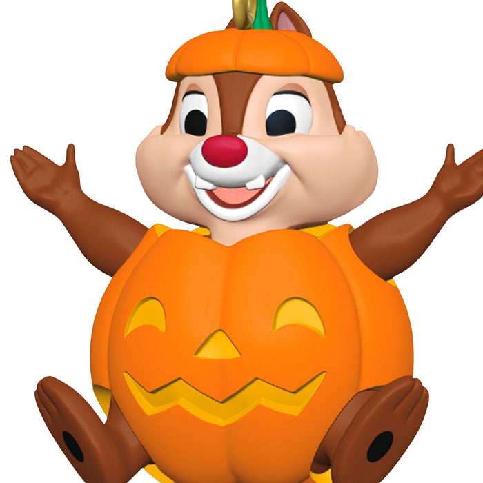 Cartoon squirrel in a pumpkin costume with a white background