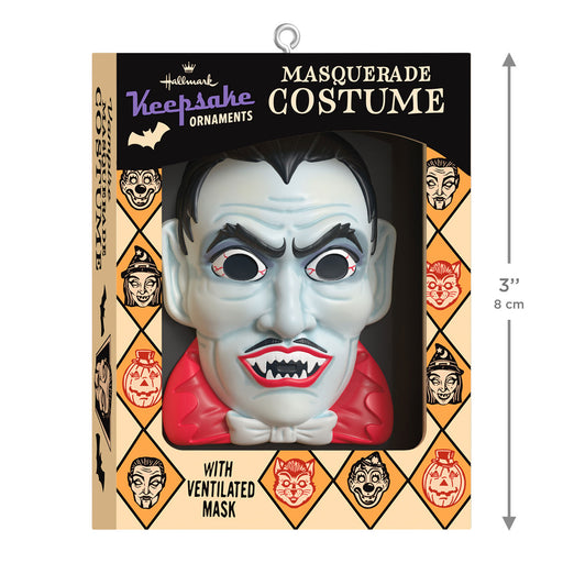 Halloween ornament packaging featuring a vampire mask with decorative border and Hallmark Keepsake Ornaments branding.