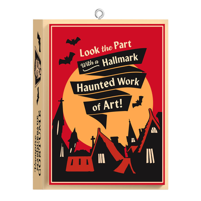 Hallmark Halloween-themed poster with a red background, orange moon, and black bats and houses.
