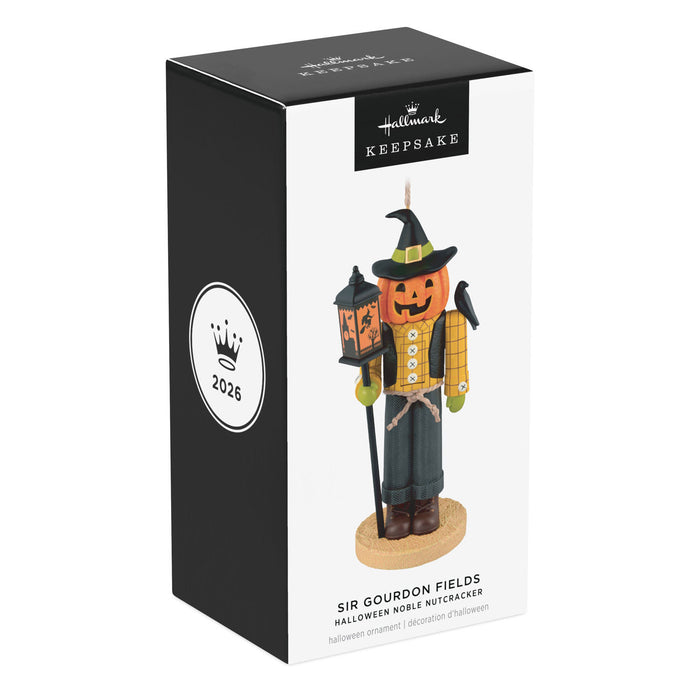 Halloween-themed nutcracker ornament in packaging with 'Hallmark' branding.
