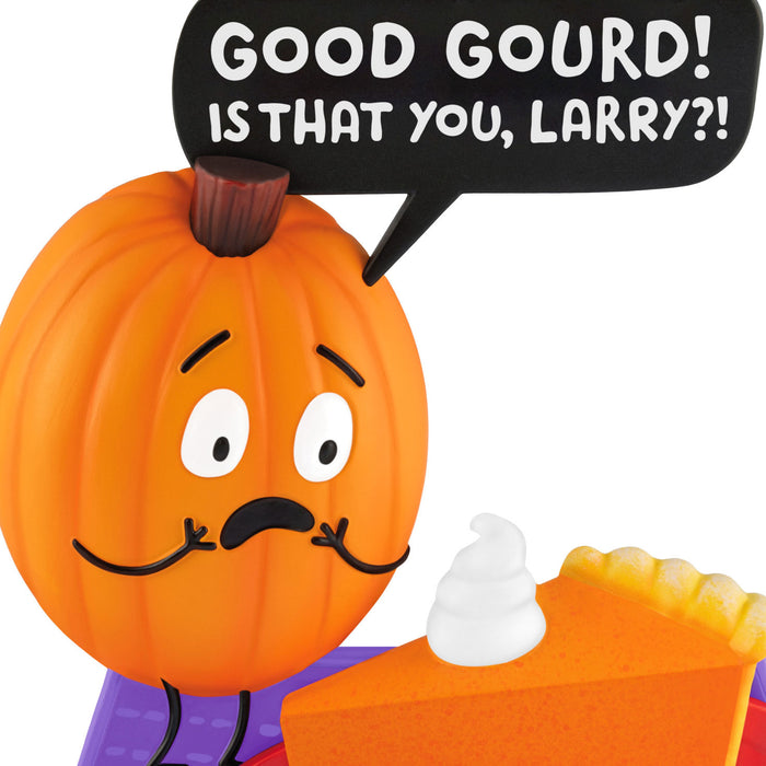 Cartoon pumpkin with a mustache and a speech bubble saying 'Good Gourd! Is that you, Larry?!' next to a slice of pumpkin pie.