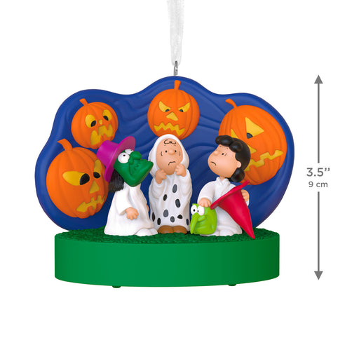 Halloween-themed ornament with cartoon characters and pumpkins, featuring measurements on a white background.