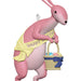 Pink rabbit figurine with a 'Happy Easter' sign and Easter eggs in a basket on a white background