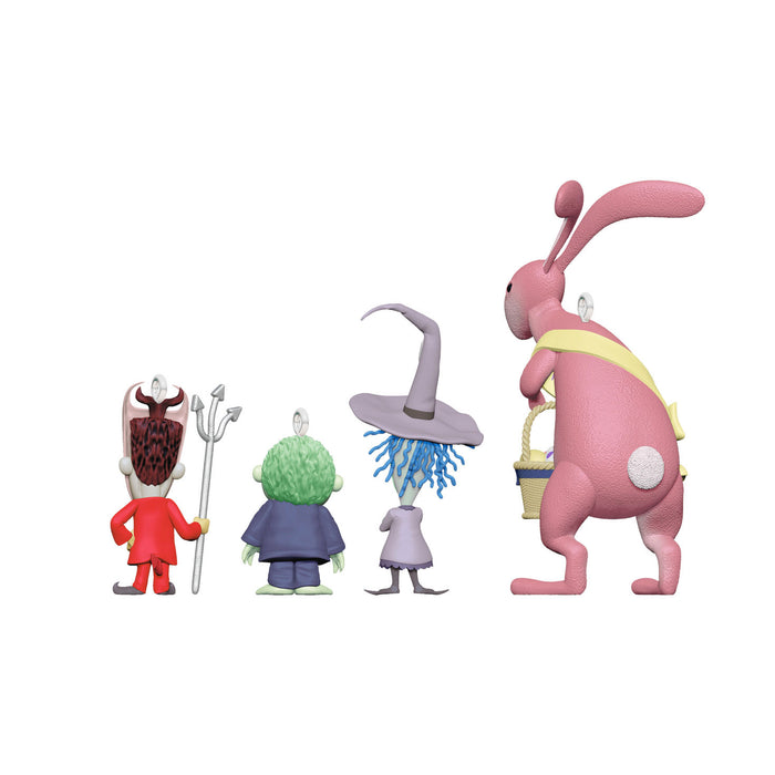 Set of colorful cartoon character figurines on a white background