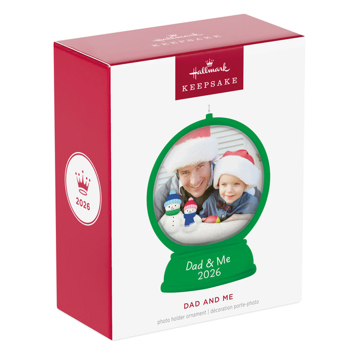 Hallmark Keepsake Christmas ornament packaging with a photo of a man and child, featuring the year 2026.