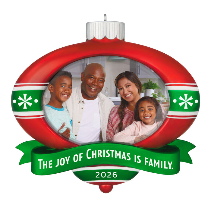 Decorative Christmas ornament with a family photo and 'The Joy of Christmas is Family' text on a white background.