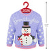 Christmas sweater with a snowman design and 'Granddaughter' text, on a hanger with '2026' label.