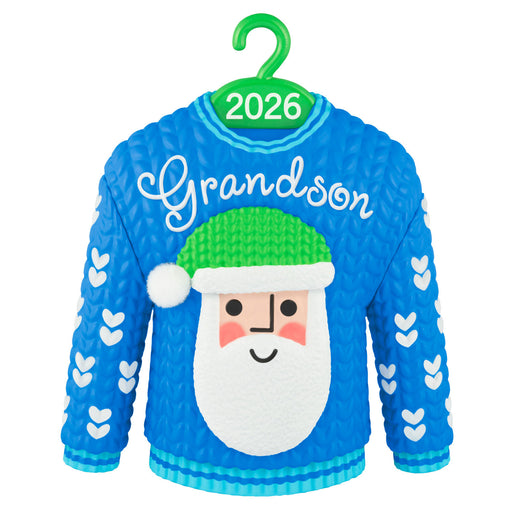 Blue sweater with Santa face and 'Grandson 2026' text on a hanger