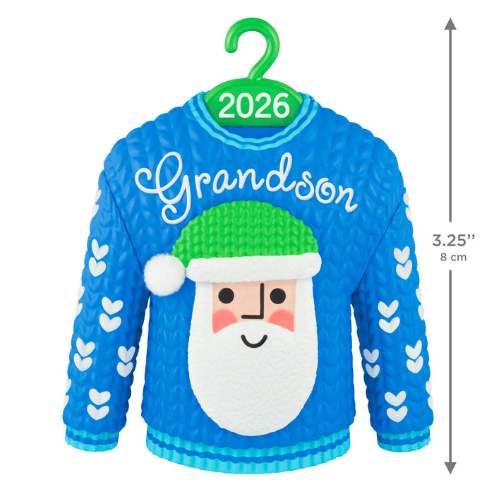 Blue sweater with Santa face and 'Grandson' text on a green hanger, with dimensions indicated.
