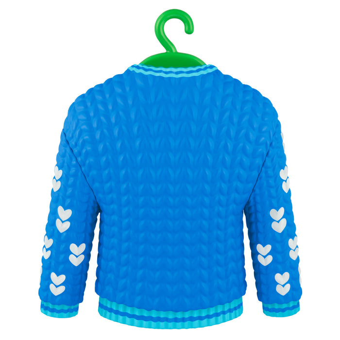 Blue sweater with white heart patterns on a green hanger against a white background