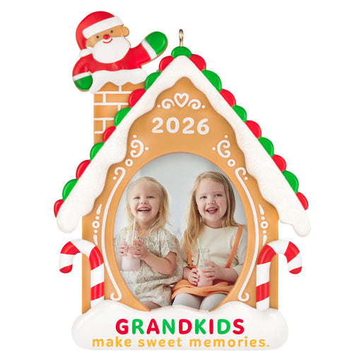 Decorative Christmas ornament with a gingerbread house design, children's photo, and '2026' text.