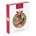 Hallmark Keepsake Christmas ornament packaging with a family photo and '2026' on a white background
