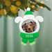 Christmas ornament with a dog photo and '2026' on a green background