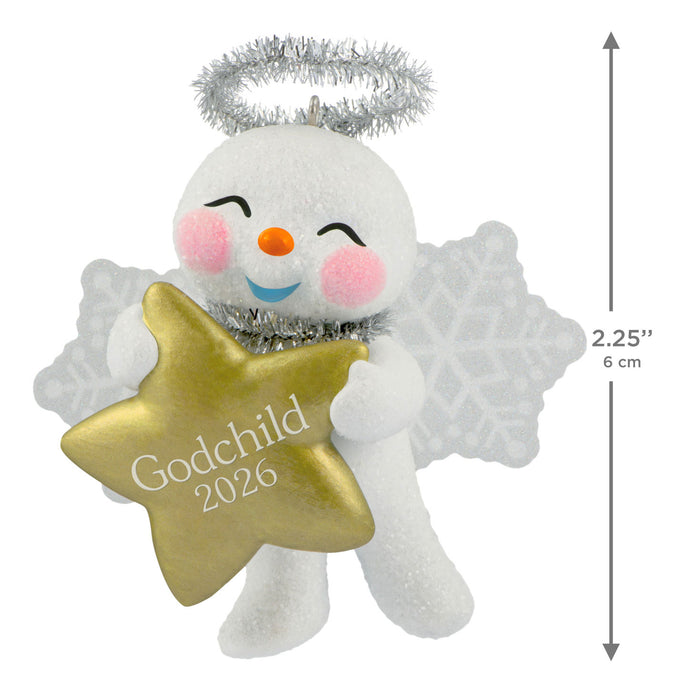 Decorative angel ornament holding a gold star with 'Godchild 2026' text, featuring a measurement indicator on a white background.