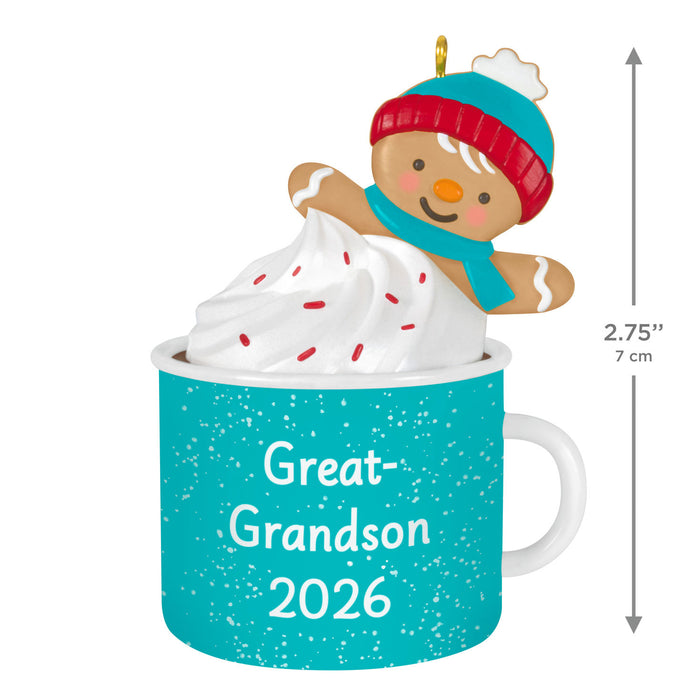 Gingerbread man in a mug with whipped cream, wearing a hat and scarf, ornament with 'Great-Grandson 2026' text.