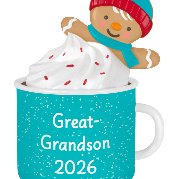 Teal mug with 'Great-Grandson 2026' text, topped with a gingerbread man and whipped cream.