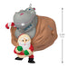 Hippo with Santa Claus ornament on a white background