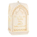 Decorative ornament with engraved text on a white background