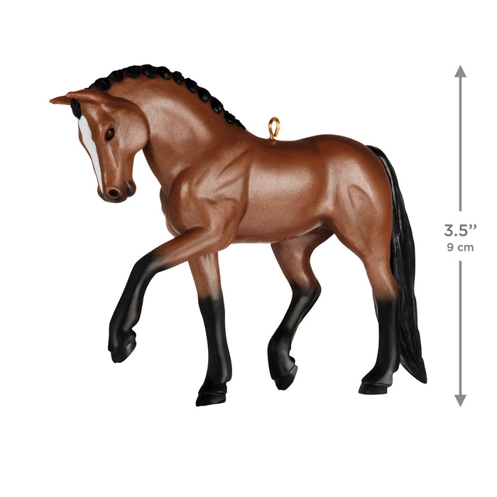 Brown horse figurine with black mane on a white background