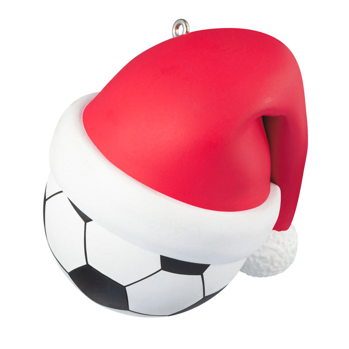 Soccer ball with a red cap on a white background