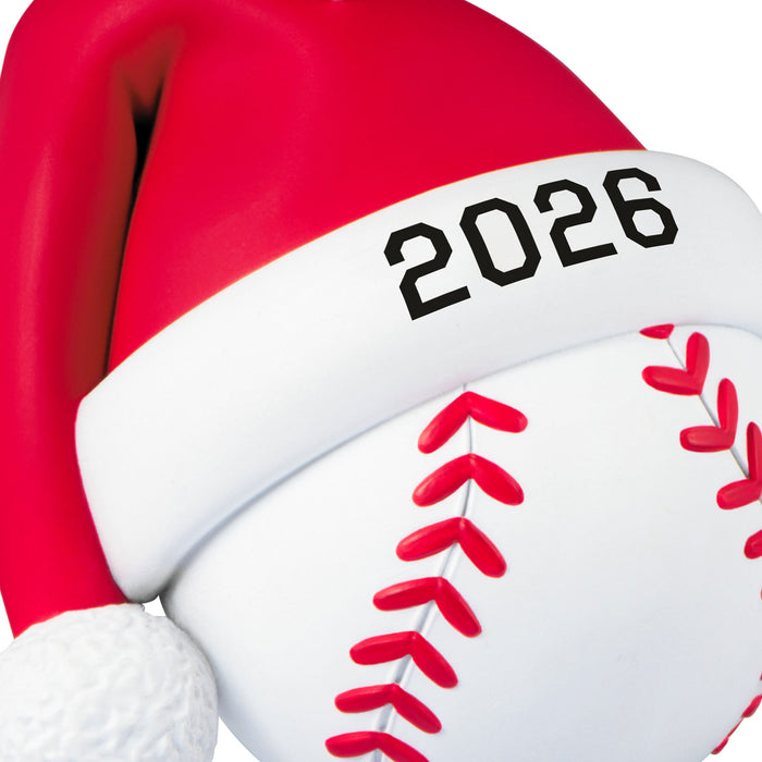 Baseball with a red and white Santa hat and '2026' on a white background