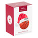 Hallmark Keepsake Christmas ornament packaging with basketball and Santa hat design on a white background