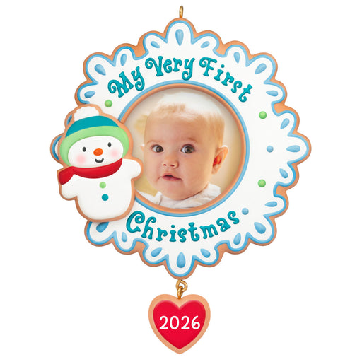 Christmas ornament with a baby's photo and snowman, labeled 'My Very First Christmas 2026'.