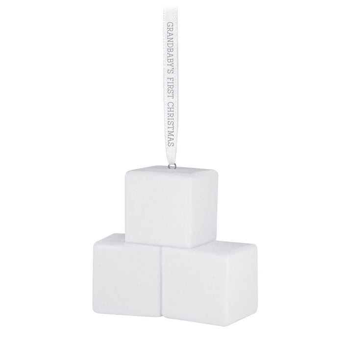 White Christmas ornament with 'Grandbaby's First Christmas' text on a white background