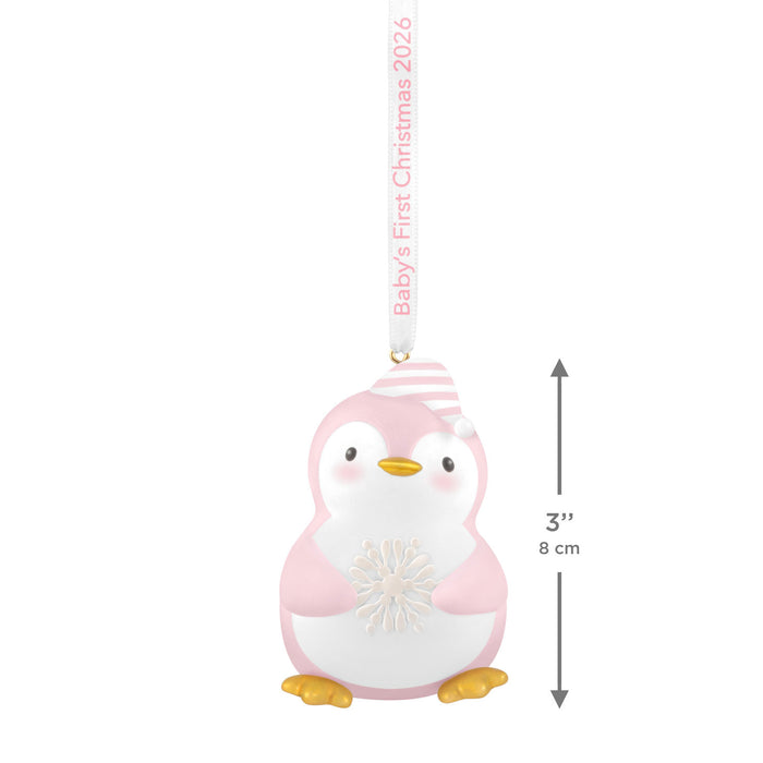 Pink penguin ornament with measurement details on a white background