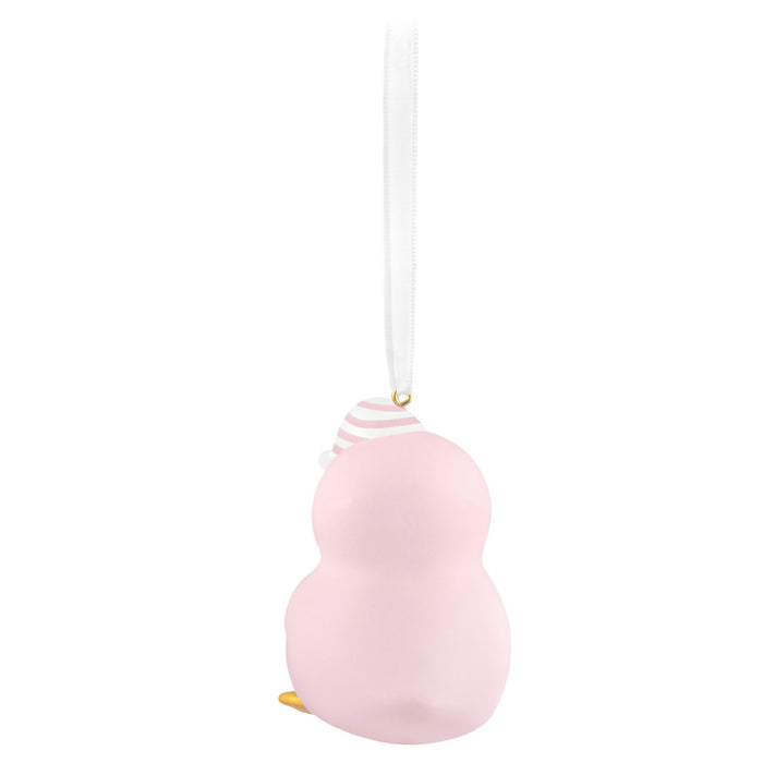 Pink penguin ornament on a white background