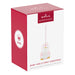 Hallmark Keepsake ornament packaging for 'Baby Girl's First Christmas' with a penguin design.