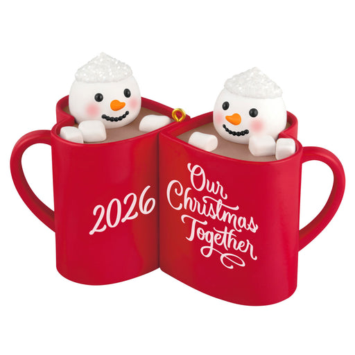 Two red mugs with snowmen inside, featuring '2026' and 'Our Christmas Together' text on a white background.