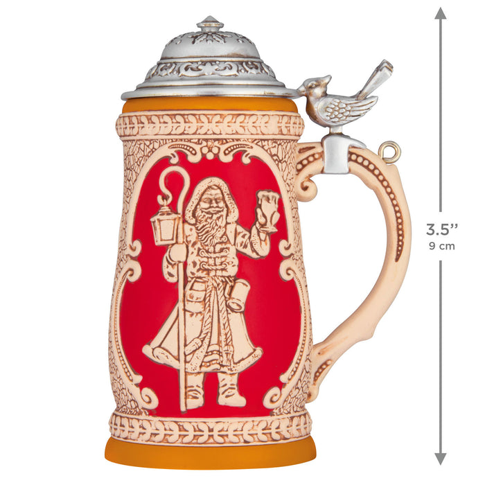 Decorative beer stein with a red panel featuring a figure, silver lid, and handle with bird design, with dimensions indicated.