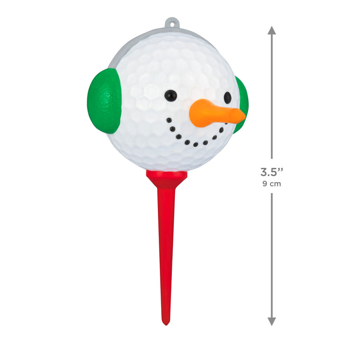 Golf ball with a snowman face on a red tee, showing dimensions.