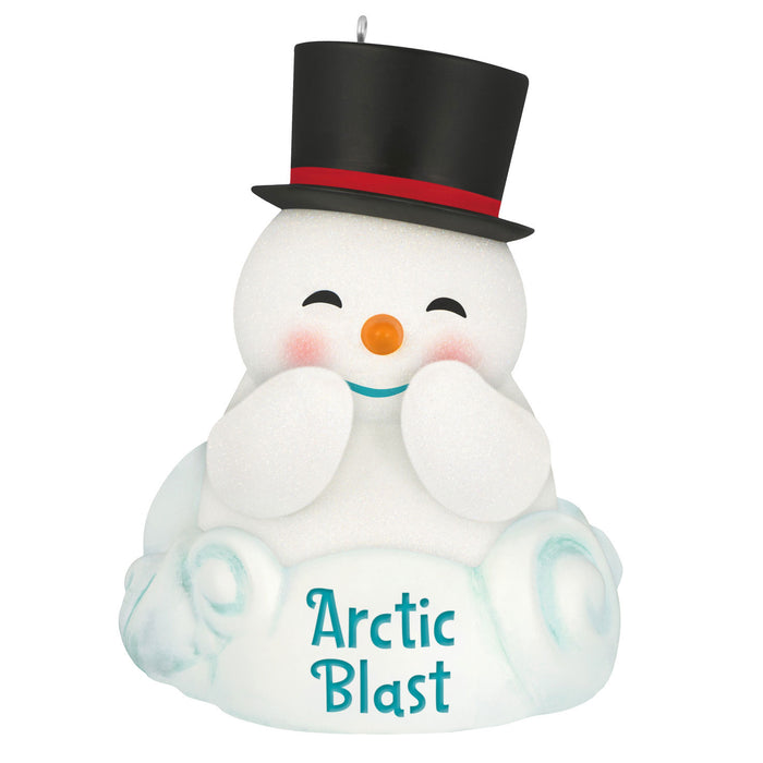 Snowman-shaped ornament with a black top hat and 'Arctic Blast' text on a white background