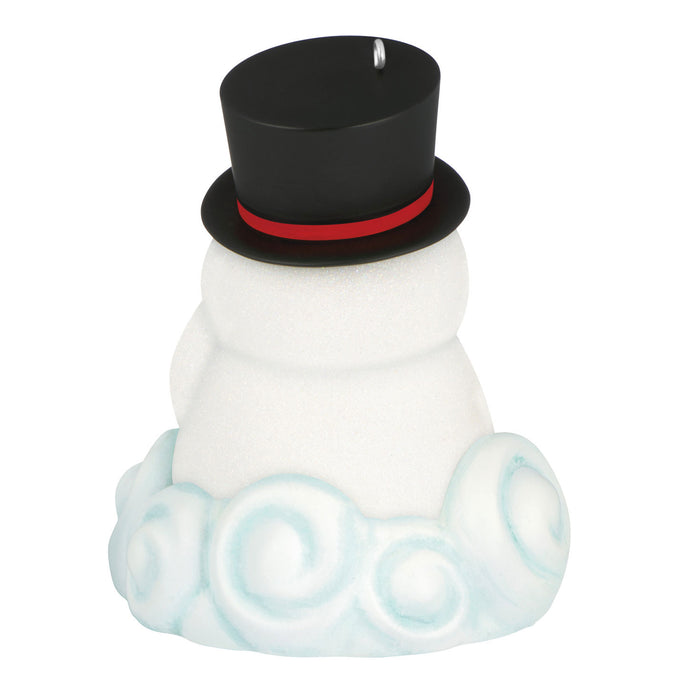 A snowman with a black top hat and red band on a white background