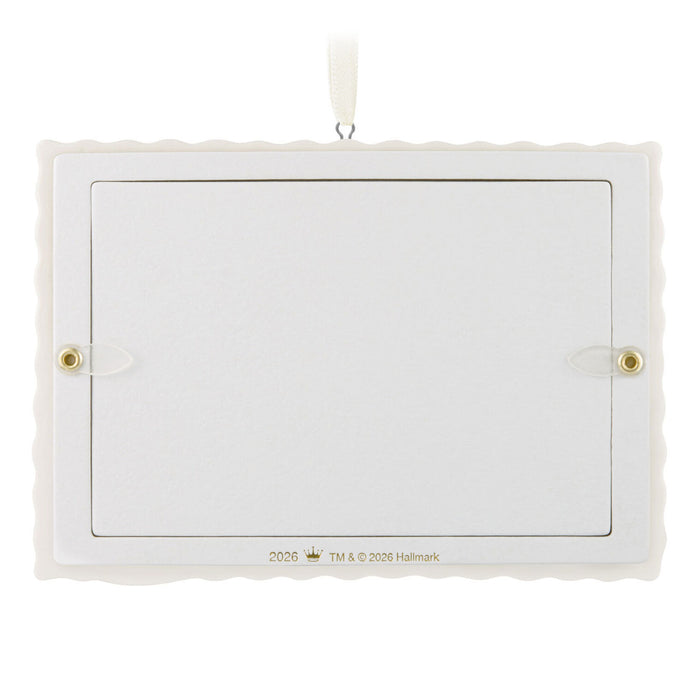 White rectangular ornament with gold accents on a white background