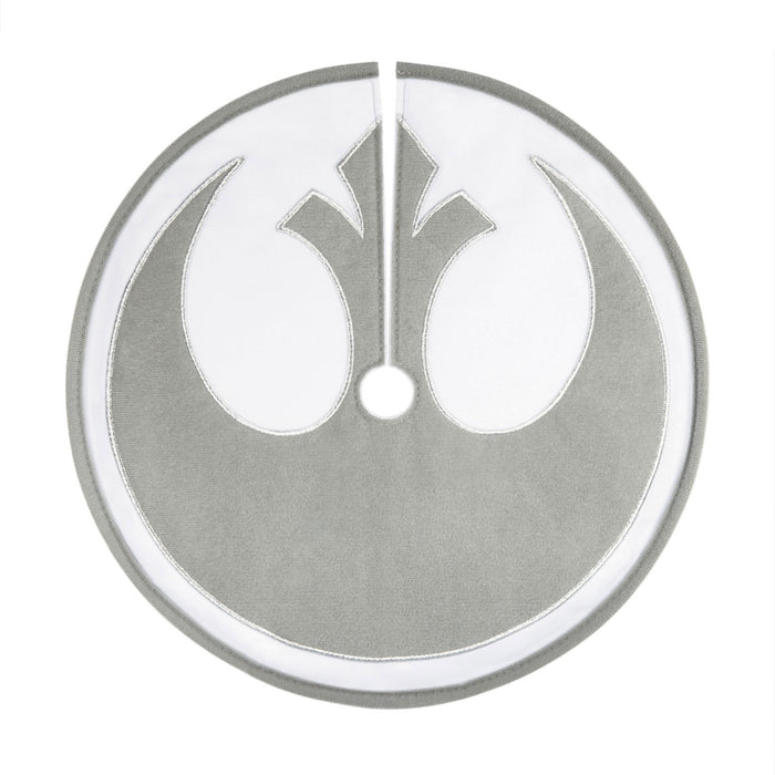 Metallic emblem with a central design on a white background