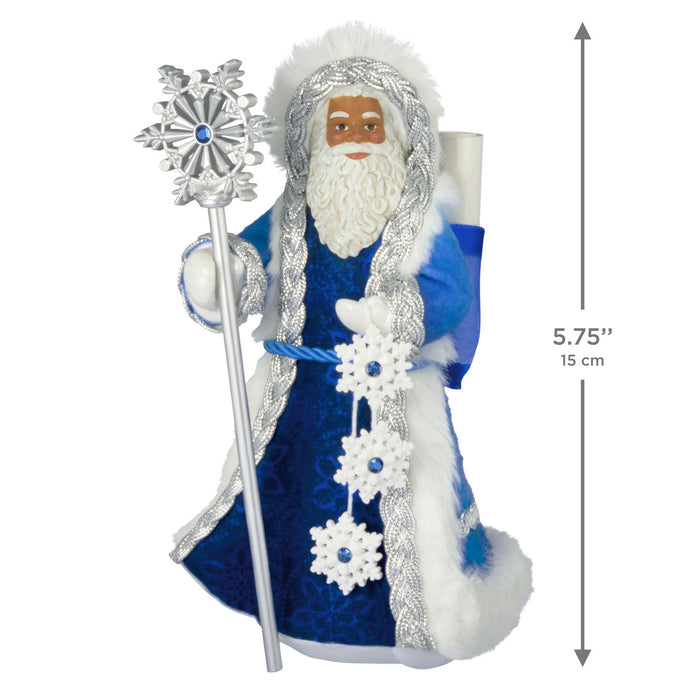 Decorative figure of a bearded man in blue robes with a silver staff, holding a candle, on a white background with dimensions indicated.