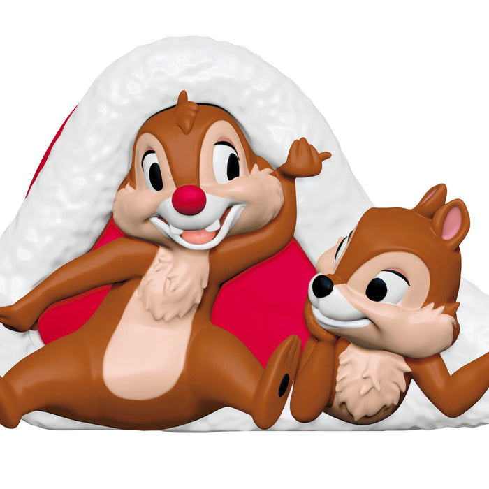 Two animated chipmunks hugging a large red heart on a white background