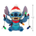 Animated character with Christmas lights and Santa hat on a white background